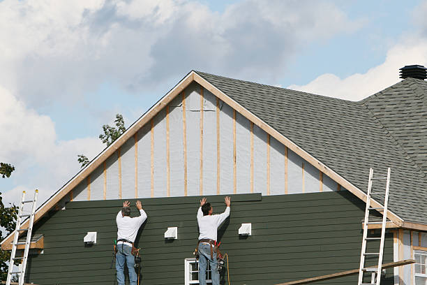 Professional Siding Replacement technician working in Forest City, PA